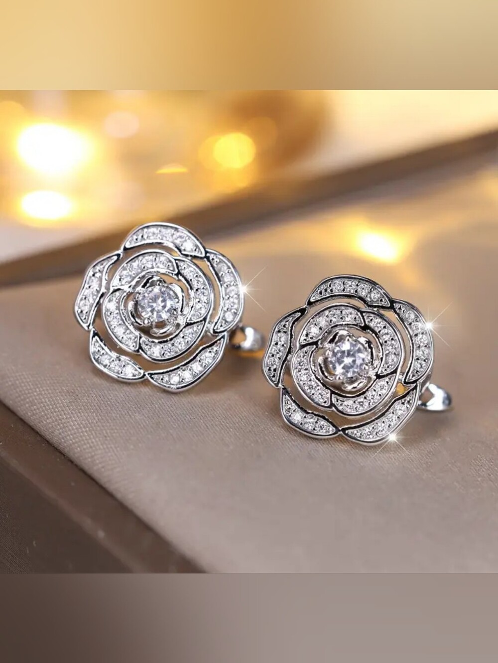 White Rhodium Rose Stud Clip Earrings